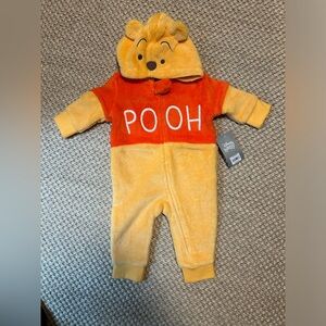 Winnie the Pooh fleece zip up onesie.